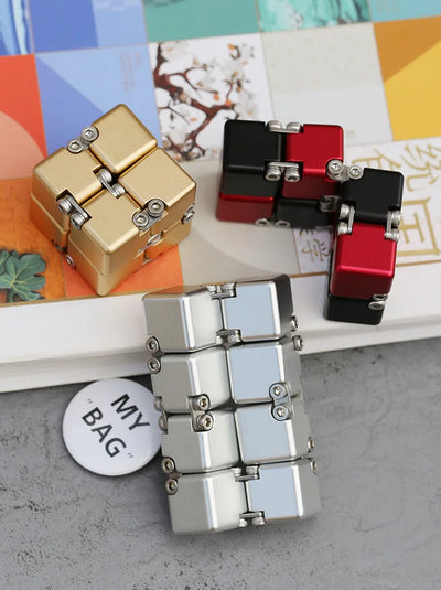 🔄 Kovinski Infinite Magic Cube – mehanska fidget igrača